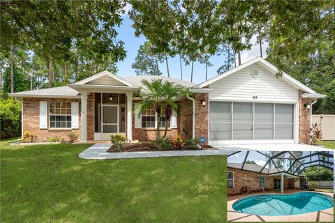 Photo of 29 Rybark Lane, Palm Coast, FL 32164 (MLS # FC315393)