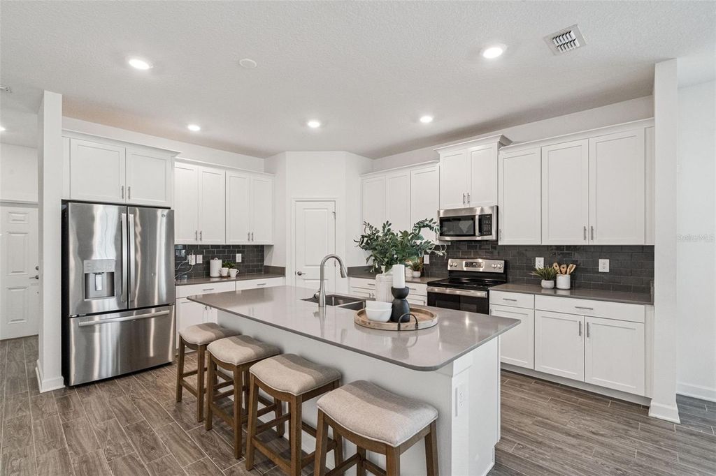 Photo of 1751 Good Neighbor Loop, Kissimmee, FL 34744 (MLS # O6372981)