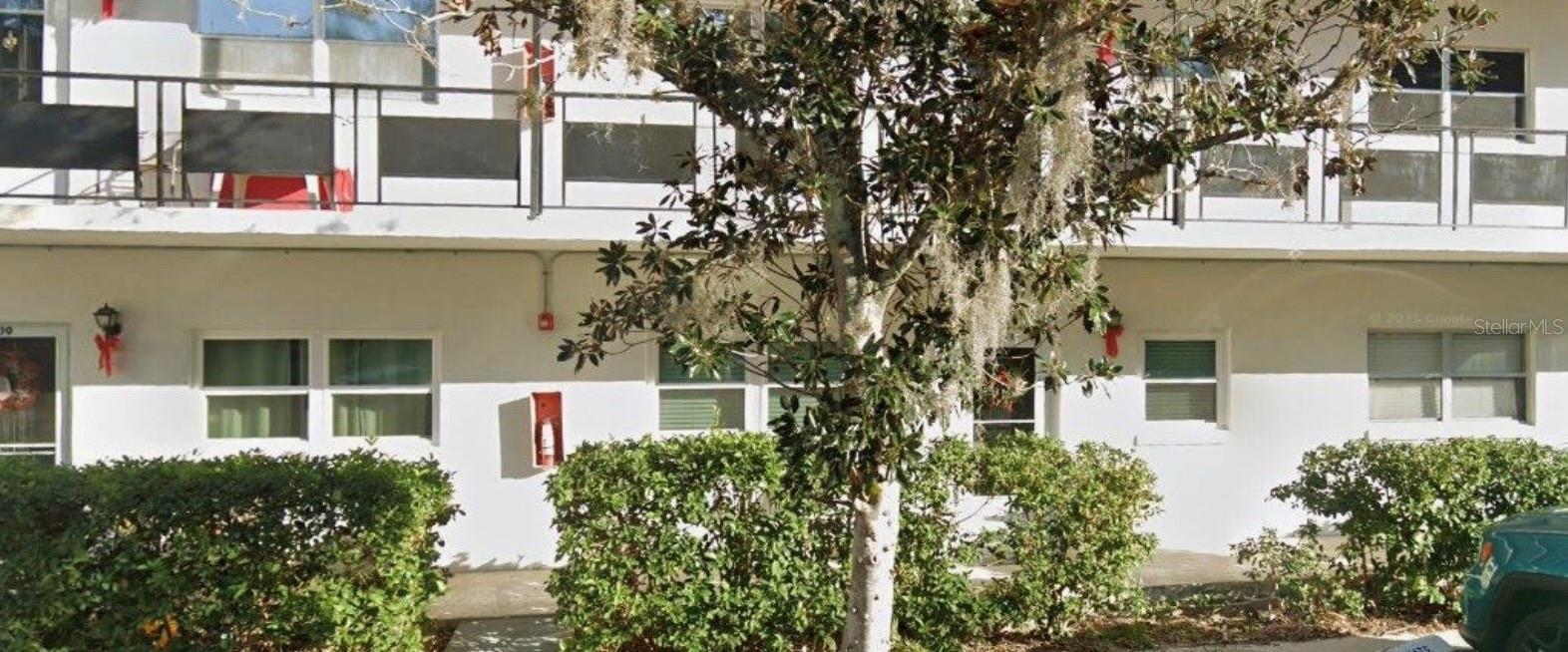 FIRST FLOOR 2 BED/2BATH Located in the Granada building of Orchid Springs with assigned parking right at your front door!. This property is situated within a 55+ age-restricted community. A small pet is allowed on the premises. Amenities include a clubhouse and community pool with views of the lagoon area right outside the back door of your unit. Additionally, Gas, Water, Trash, Sewer and Exterior Grounds maintenance is all included!
