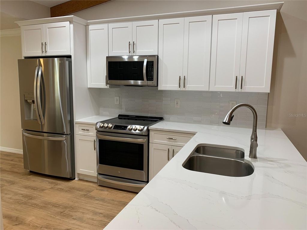 Photo of 2658 Sequoia Terrace, Palm Harbor, FL 34683 (MLS # TB8484069)