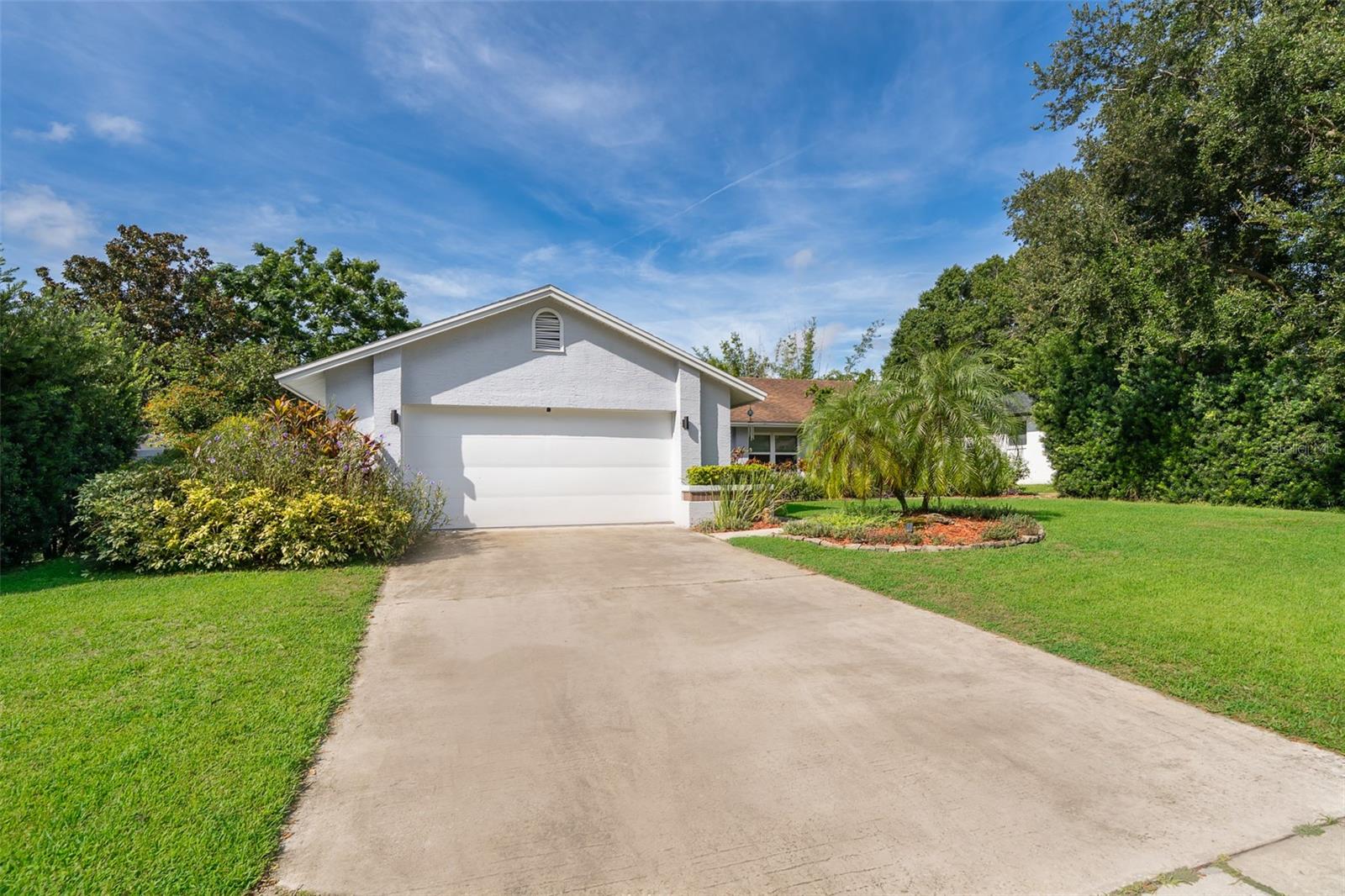 Located in the highly sought-after Silver Woods community in Windermere, this beautifully updated single-story home offers 3 bedrooms, 2 bathrooms, and a 2-car garage, featuring an open and airy oversized great room that seamlessly connects to the dining area and kitchen, with skylights that flood the space with natural light and enhance energy efficiency. The spacious backyard boasts a private pool, ideal for relaxing or entertaining, while recent updates include a Tesla charger, vinyl fencing, a 2021 A/C, and fresh interior and exterior paint in 2023. Perfectly situated just half a mile from The Grove, 5 miles from Universal Studios, and 9 miles from Disney World, with easy access to Dr. Phillips and Restaurant Row, this home is zoned for top-rated schools and has a low HOA fee of only $363.83 per year—offering an unbeatable combination of comfort, convenience, and prime location.