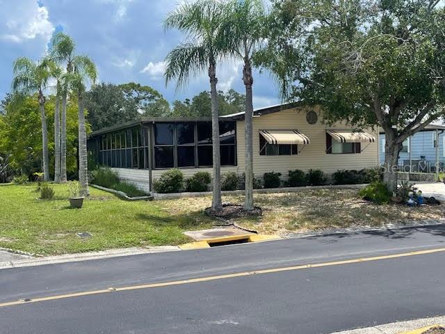 Welcome to Caribbean Isles Residential Cooperative. This home is a large Partially Furnished 3 bedroom, 2 bath home on the Saint Georges Canal with Dock and Structure for Boat Lift. 71' of Canal Frontage. The Laundry just off the Kitchen and as you enter the home. The Primary Bedroom has a large Walk-in Closet with an Ensuite. Great Screened Patio to just sit and watch the world go by. The home is low maintenance and well-maintained. Large living room and Dining area. Large Carport with 2 storage buildings. Caribbean Isles is a VERY Active 55+ community. From Shuffleboard and Bocce Ball to Corn Hole and Horseshoes. We welcome Golf Carts and several times a year we gather and decorate for Parades. The Clubhouse is used for Dances, Games, Dinners and more. In the Clubhouse we have a well-stocked Library and a large Craft Room. The Game Room has 3 Billiard Tables, 2 Poker Tables, a Bar Shuffleboard with 2 Dart Boards. Don't miss this opportunity.
Interior Pictures to follow.