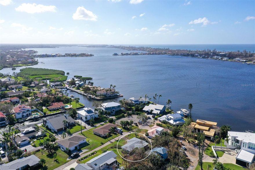 PRICE ADJUSTMENT!! Yes you can own here! Rare opportunity own West of the Trail and South of Stickney Point Rd, in this hidden paradise. Home has sustained hurricane damage which opens the door for a custom built home for your personal pleasure or invest for the spectacular view and an income producing rental! ONE MILE walk or bike to Crescent Beach and the World Famous Siesta Key Beach or kayak across the beautiful Little Sarasota Bay. Located on a cul de sac just a short distance to Publix and shops and a short drive to Downtown Sarasota, this home on a quarter acre lot with private backyard and no HOA is perfect for your dream home. It is all about the location! Call today to schedule an appointment.