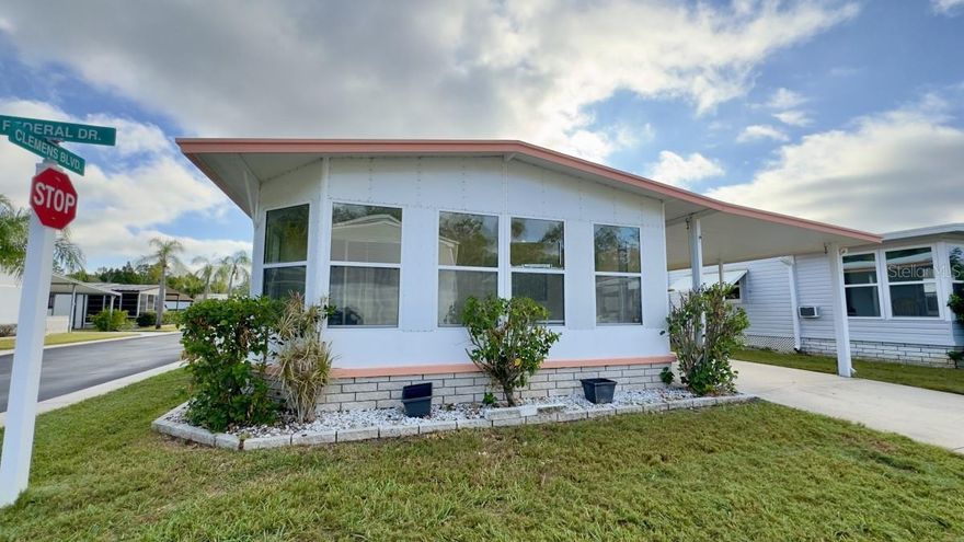 Spacious, move-in ready, this 2-bedroom, 2-bathroom double-wide manufactured home is located in the sought-after resident-owned gated community of Senate Manor in Port Richey. Built in 1979, this home features a spacious open layout, a private primary suite with large walk-in closet, brand-new luxury vinyl plank flooring throughout, and a newly renovated kitchen with custom painted cabinetry and stainless-steel appliance package. A large, fully enclosed front porch for all your entertaining needs, in addition an outside covered patio as well. No stone left unturned here everything is fresh and clean. New A/C unit, New hot water heater and updated electrical panel. Senate Manor offers a strong sense of community with a low $200/month HOA that includes water, sewer, trash (with recycling twice weekly), lawn maintenance, street lighting, a heated pool and spa, shuffleboard, horseshoes, a clubhouse, gym, and optional storage for boats, RVs, and trailers. The social calendar is packed with events… something for everyone. Conveniently located near Gulf beaches, shopping, dining, and medical facilities, comfort, convenience, and community Visit the Senate Manor Estates HOA website for additional information 
This home did experience flooding during hurricane Helene.