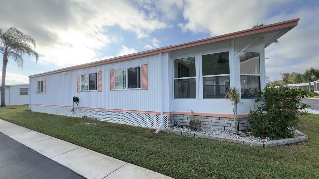 Photo of 10928 Federal Drive, Port Richey, FL 34668 (MLS # A4671643)