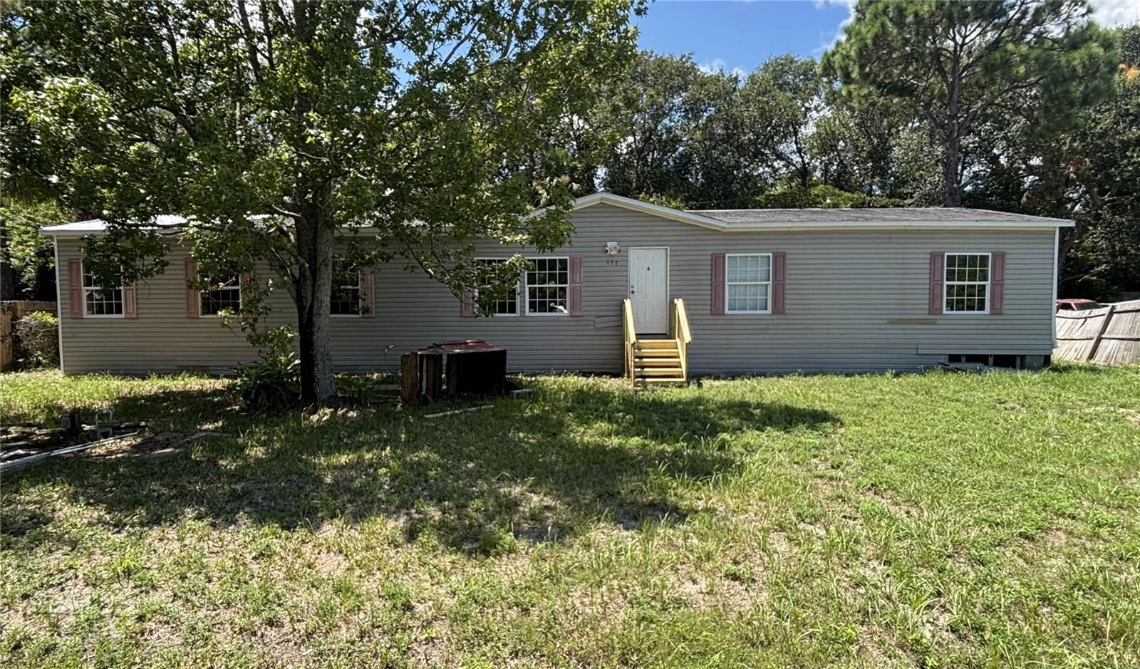 This property is being sold as-is and sits on a .24-acre lot, offering excellent potential for customization. The owner is willing to finance the purchase with as little as 10% down and is also offering 100% financing for a renovation loan, making it an ideal opportunity for buyers looking to invest or personalize their new home. Recent improvements include new steps leading to the front porch, adding to the home’s charm and curb appeal. Don’t miss this flexible financing opportunity with built-in renovation support—perfect for investors or buyers seeking a project with strong upside potential.