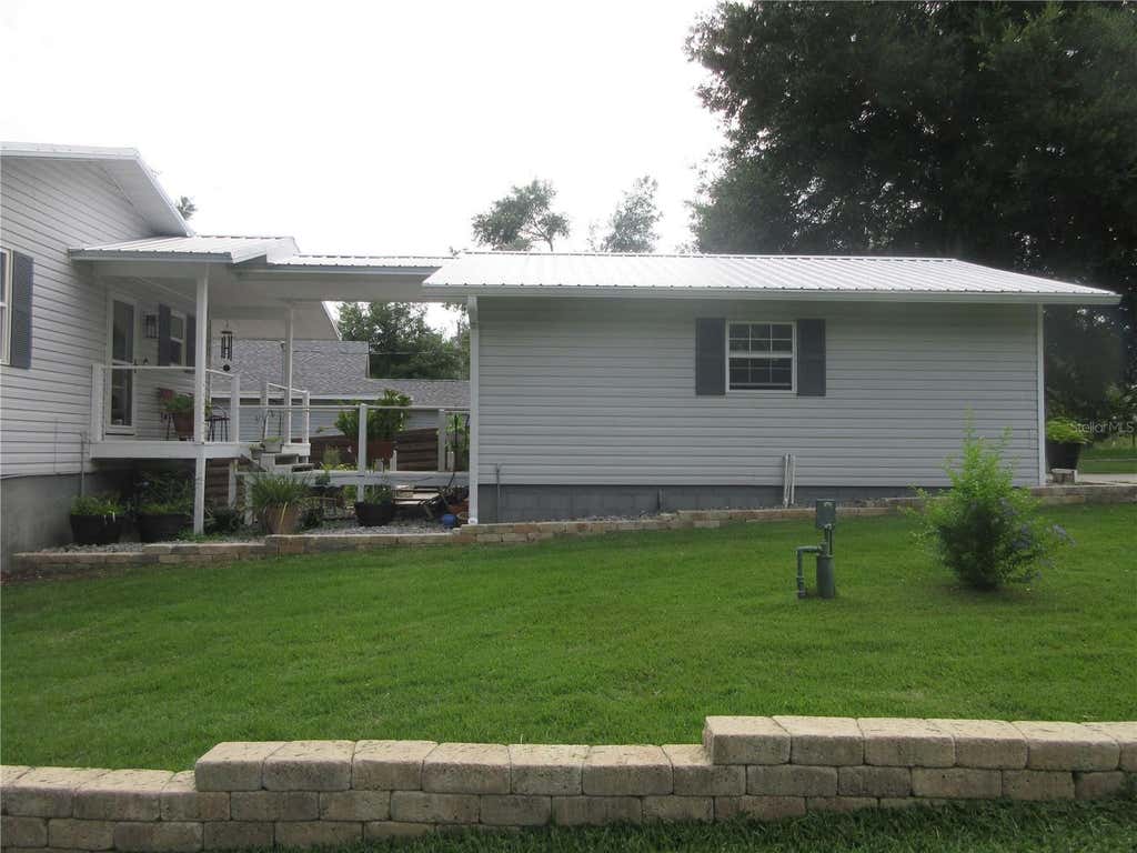 Photo of 16849 SE 59th Place, Ocklawaha, FL 32179 (MLS # OM726650)
