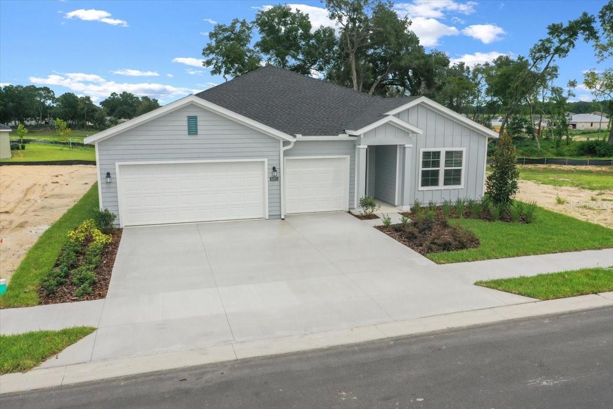 Beautiful BRAND NEW construction 2025 home that has never been lived in, and is pet friendly even for a larger dog! Located in the new Community of Pioneer Ranch just a short drive off of SR 200 in SW Ocala and only 6 miles from I-75. This executive home has 2,571 square feet under A/C, with 4 Bedrooms, 3 Full Bathrooms, and a 3 Car Garage. No need to pay for Fiber optic internet service, lawn care, or HOA fees as they are paid for by the Owner and included in the rent. The chef's kitchen features quartz countertops, stainless steel appliances, a large island with room for 4 barstools and a walk-in pantry. Plenty of room to entertain your guests in the huge, 18x29 living room. The primary bedroom is 17x15 with an oversized walk-in closet. The en-suite bathroom features a large, tiled walk-in shower, soaking tub, and a double vanity with quartz countertops. The laundry room includes the washer, dryer and a utility sink that has recently been installed. Enjoy the year round warm Florida weather on the covered, screened in 18x10 back porch lanai overlooking a green space area with big oak trees. This home is full of extras, including an electronic smart front door lock, a Ring Pro video doorbell, and no neighbors on either side or directly behind the property. Pioneer Ranch is in the process of constructing great amenities for all residents to enjoy, estimated to be completed approximately in March 2026. Upcoming luxury amenities will include: resort style pool with cabanas, expansive community clubhouse, fitness center, pickleball courts, dog park, and a playground. Centrally located just a short drive to schools, restaurants, shopping, medical facilities and still only 10 miles away from the famous World Equestrian Center. First month's rent and security deposit required for move in. Don't miss your chance to live in this gorgeous home, schedule your showing today.