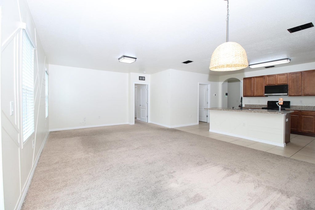 Photo of 3238 Bayou Bay Drive, Lakeland, FL 33811 (MLS # O6432774)