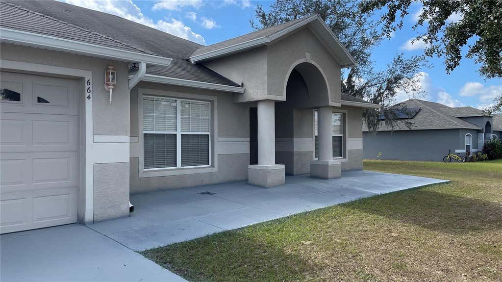 Photo of 664 Hatchwood Drive, Haines City, FL 33844 (MLS # S5152422)