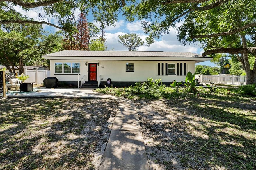 Welcome to this beautifully updated 3-bedroom, 3-bath home located on a desirable corner lot in Ormond Beach, offering the rare advantage of no HOA.
The layout offers comfortable, easy living with well-proportioned spaces that flow naturally for both everyday life and entertaining. The kitchen features an island/breakfast bar and stainless steel appliances, creating a functional and inviting space at the heart of the home.

Parking and storage are well covered with both a one-car garage and a one-car carport. A full exterior bathroom adds rare convenience, perfect for rinsing off or cleaning up before entering the home after time spent outside.

Recent improvements include a new fence surrounding the entire property for privacy and security, along with new pavers along the side of the home to extend the driveway and enhance usability. A separate privacy-fenced area creates a cozy outdoor retreat, ideal for seating and a fire pit at the front of the property.

The front yard is spacious and shaded by 3 mature oak trees, offering a naturally inviting setting to relax and unwind. The fully fenced yard includes a patio out back for relaxing and enjoying time outdoors.

Historic Downtown Ormond Beach is only 3/4 mile away, offering easy access by bike or car, with nearby restaurants, bakeries, antique shops, and the Ormond Beach Library. Beach access is just 1.7 miles away, also accessible by bike or car. The Casements is only 1.3 miles away and offers weekly community events along with beautiful grounds.

Situated in X flood zone, the location offers added peace of mind while keeping you close to the coastal lifestyle. Enjoy quick access to nearby recreation along the Halifax River and the scenic Tomoka River, both known for boating, fishing, and natural Florida beauty.

With thoughtful updates and outdoor enhancements, this home delivers comfort, flexibility, and true coastal living in one complete package in Ormond Beach.