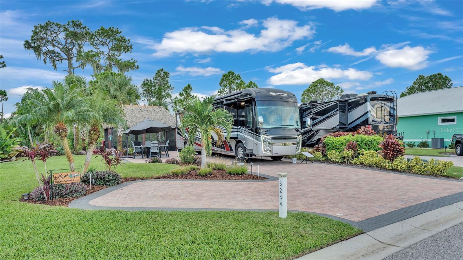 Beautiful lake view lot includes: Expanded lot with extra pavers, mature landscaping, a georgeous water feature, custom outdoor landscape lighting, 12’ x 20’ tiki hut screened in, lighting, several electrical outlets (cable ready), and a lifetime outdoor kitchen with bar seating by Dreamscapes. This property wont last long, and is priced to sell!
Bay Lake Motorcoach Resort is a Class A motorcoach resort offering incredible amenities. Owners and visitors can fill their days with activities and club outings or simply relax and enjoy the resort. Whether in search of community, travel, relaxation or recreation, Bay Lake is your home base for the Florida Lifestyle.