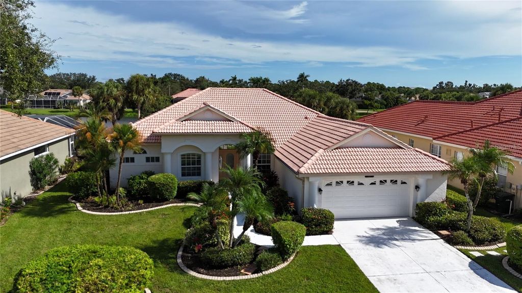Photo of 4971 Sabal Lake Circle, Sarasota, FL 34238 (MLS # A4692802)
