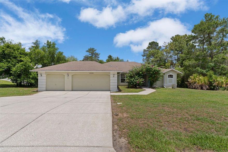 Beautifully maintained pool home on .50 acre with 3 bedrooms, office, 2 baths, 3 car garage offering 1841 square feet of comfortable living space.  No HOA or CDD fees on this home!  Bright and airy rooms in neutral colors.  Kitchen was remodeled in 2022 with new cabinets, granite countertops, flooring, and new lights and fan.  New septic and drainfield in 2021.  Newer appliances in kitchen.  Hurricane shutters.  Shed.  Irrigation for lawn.  8 ft sliders open to the pool which has a pool valet for self cleaning.