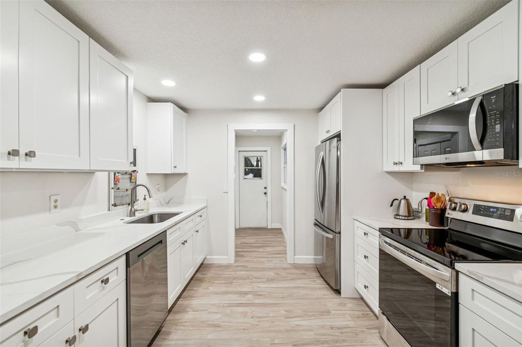 Photo of 712 Lemonwood Dr, Oldsmar, FL 34677 (MLS # TB8459392)