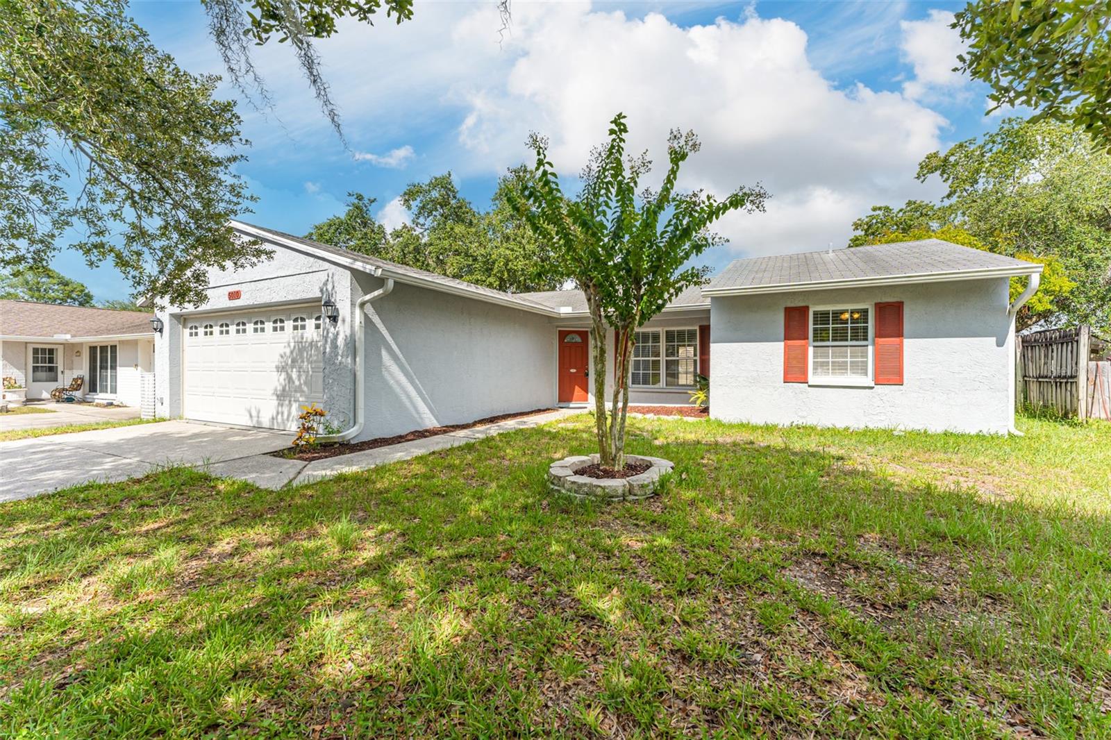 This 3 BR / 2BA / 2 Car Garage home is nestled within the cozy Meadows community which is central to both 54 & Hwy 19. Freshly painted, and updated with luxury vinyl plank flooring in the bedrooms. Large format tile throughout all the common areas. Featuring stainless steel appliances in the kitchen with a cute breakfast nook that overlooks the fully fenced backyard. Master Bedroom is large, and the master bath has been updated with new contemporary vanity and features a walk in shower. The backyard is fully fenced and features a fully screened and covered patio. Truly a beautiful home. Available immediately.