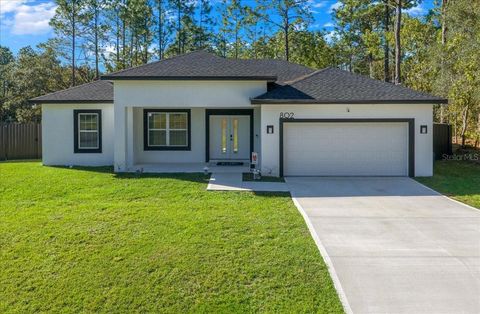 Photo of 802 W Hemlock Drive, Citrus Springs, FL 34434 (MLS # OM711809)
