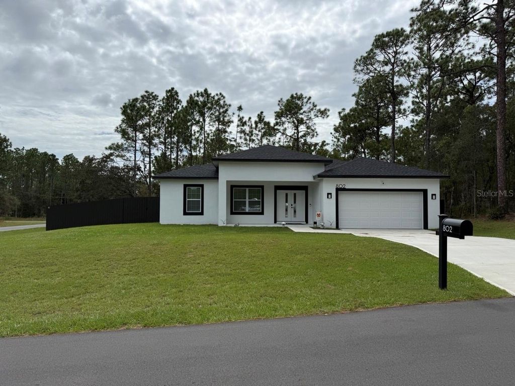 Photo of 802 W Hemlock Drive, Citrus Springs, FL 34434 (MLS # OM711809)