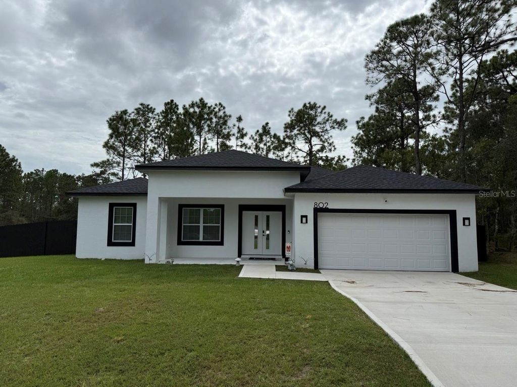 Photo of 802 W Hemlock Drive, Citrus Springs, FL 34434 (MLS # OM711809)