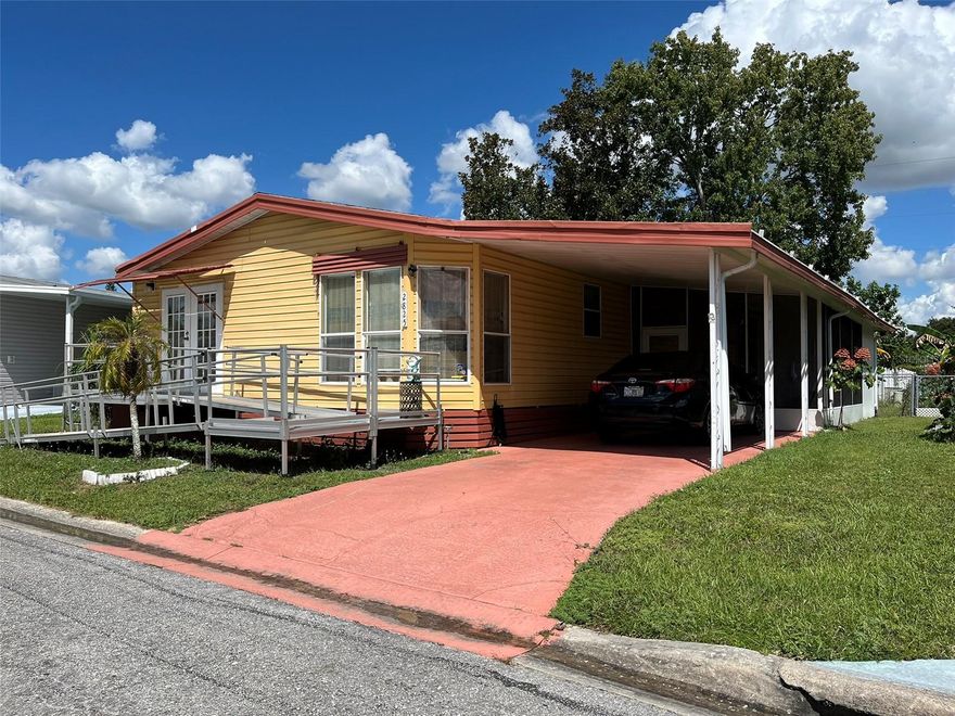 Motivated Seller! This 1990-built double-wide home is in the perfect Florida retirement community: Starlight Ranch! It's a highly desirable 55+ retirement community where every day feels like a vacation and neighbors become lifelong friends. This beautifully maintained 2-bedroom, 2-bath home is move-in ready and designed for comfort, relaxation, and entertaining. Home Features You’ll Love: • Spacious & Bright• A modern kitchen with all appliances and abundant cabinet space. • Perfect for Gatherings: Open dining area flows into a large front living room, ideal for hosting family and friends. • Ample Parking & Storage: Long driveway and large storage shed for your convenience.  //  Starlight Ranch is a resort-style retirement living community that's near local shopping and dining—-and only 28 miles from Walt Disney World! (See map picture) Community amenities Include: Two spacious clubhouses with weekly social activities. Well-equipped fitness center to stay active. Fully stocked library and game rooms for leisure. Two sparkling swimming pools to cool off and relax. Tennis courts, shuffleboard, and walking trails. RV storage for your adventures. Pet-friendly community—-bring your furry friends! This is more than a home-—it’s a lifestyle. Schedule your showing today!