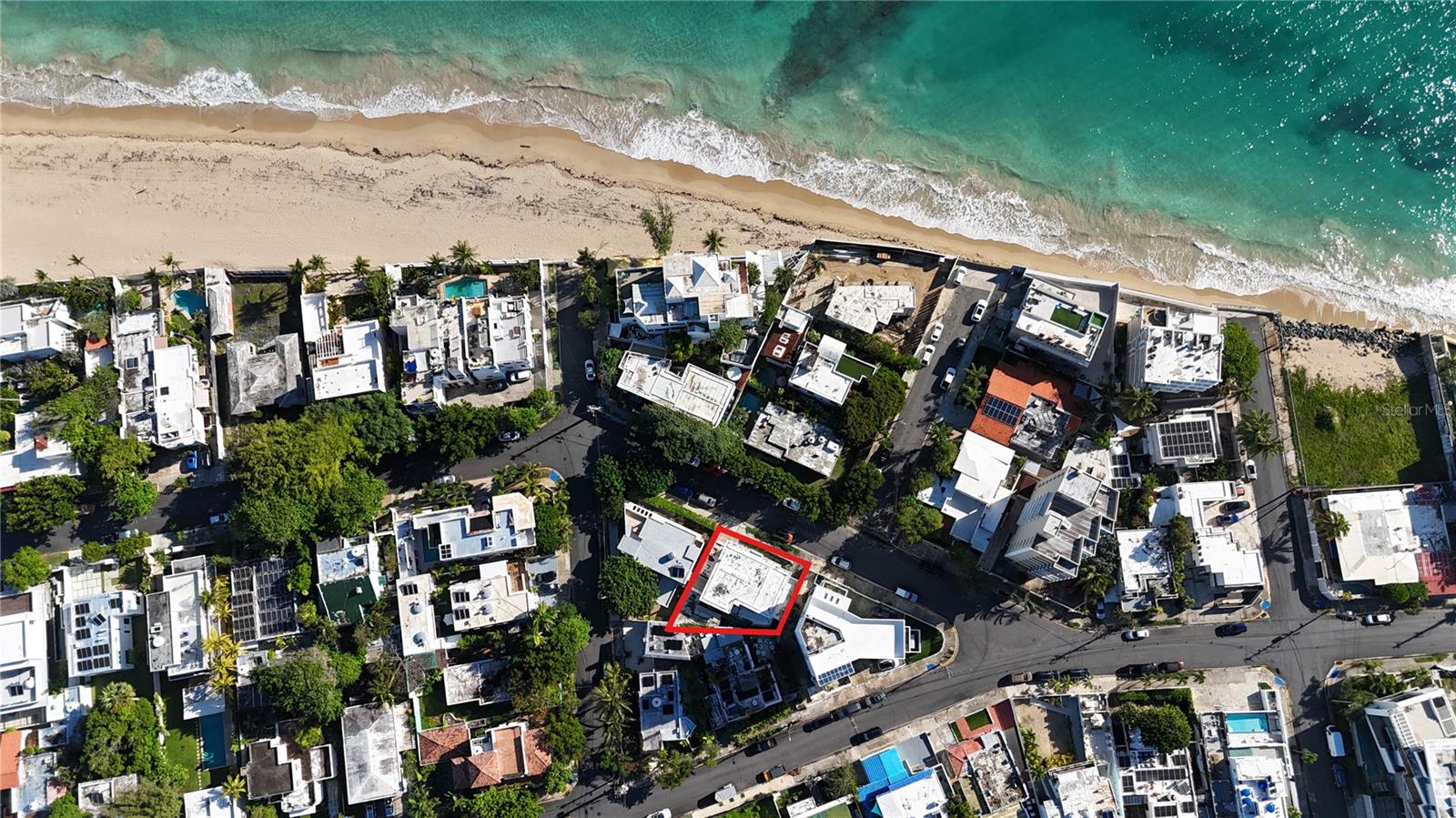 Value-Add Multifamily in Ocean Park – Steps from the Beach on Calle Italia
Located just one block from the sand in San Juan’s iconic Ocean Park neighborhood, this rare five-unit multifamily property sits on the highly coveted Calle Italia and offers a unique opportunity for investors or owner-occupants. The property is currently vacant, providing a blank slate to renovate and reposition for short-term, long-term, or mixed-use income.
Property Layout:
• Main Residence (Ground Floor – approx. 1,407 sq. ft.):
3 bedrooms, 2 bathrooms, living room, dining area, kitchen, laundry, utility, and storage rooms. Includes a 1-car carport and access to a fenced, paved patio area, ideal for outdoor living or future enhancements.
• Unit 2 (Second Floor – approx. 733 sq. ft.):
2-bedroom, 1-bath unit with open kitchen/living/dining space and two private terraces, offering excellent indoor-outdoor potential.
• Unit 3 (Second Floor – approx. 344 sq. ft.):
1-bedroom, 1-bath apartment with a private balcony.
• Unit 4 (Second Floor – approx. 374 sq. ft.):
1-bedroom, 1-bath unit with flexible layout and access to a shared terrace.
• Rear Unit (Approx. 377 sq. ft.):
A separate 1-bedroom apartment located behind the main house with its own kitchen and living space—great for guest use or rental.
Condition: The property will benefit from renovation. With a great location, it’s ideal for buyers looking to add value and maximize rental income. This is a rare opportunity to transform a multifamily asset in a premier coastal location—steps from the ocean and minutes to everything in San Juan.