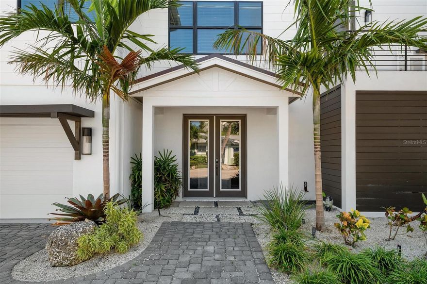 With $245k annual income for 2023 you don't want to miss this great opportunity! This high-end and well-appointed spectacular home offers a rich variety of options for the homebuyer.  The savvy investor has the opportunity to maximize earnings with a proven desirable rental. The family-oriented buyer can realize their dream of securing a beach front family retreat while building a legacy for generational wealth.
This newer built home affords good return on investment with short-term, weekly rental opportunities to profit when you’re away. Just a short stroll from the beach, this beautiful custom-built 4-bedroom, 4.5-bath home with a bonus loft offers a private resort-like sanctuary boasting a waterfall pool and spa, gorgeous Gulf of Mexico views, lush tropical landscaping and an expansive covered outdoor space for dining and entertainment. The nearly 3,000-square-foot Holmes Beach residence spans three levels, featuring multiple balconies plus a rooftop terrace for savoring striking Gulf and sunset vistas. Artfully designed and decorated as a family beach retreat, the home’s bright and warm ambiance is enhanced by stylish and upscale finishes for illustrious island flair. Floor-to-ceiling glass sliders set the tone of the home as they open the main living and dining areas to an ample balcony that complements the entire space for waterfront entertaining beyond compare. Continuing the coastal narrative, the open kitchen is backdropped by bay views and equipped with shaker style cabinetry, a generous island, lovely quartz countertops and stainless appliances including a gas range. All four en-suite bedrooms are conveniently separated and private, each boasting gracious and indulgent baths. The light and bright open floorplan includes abundant windows, neutral tile flooring and stylish coastal décor throughout. Overlooking the spacious living and dining areas, the sleek and inviting gourmet kitchen is the perfect gathering place for friends and family, offering an oversized island with seating, double quartz countertops, solid wood cabinetry and high-end stainless-steel appliances. Glass sliders open to a balcony for even more entertaining space. Four distinctively designed bedrooms, each featuring deluxe en-suite baths with quartz countertops, are ideal for vacationing guests. An elevator on the ground floor will whisk you to your private third-floor master suite, which includes a Gulf-facing patio, vaulted ceiling, and sumptuous bath with dual quartz vanities, a large frameless glass shower and soaking tub. Whether a primary home or vacation retreat, you’ll relish this fabulous seaside oasis and all that Anna Maria Island offers, from pristine sugar-sand beaches to a plethora of outstanding restaurants and boutiques.  For a video walk through of the home, copy and paste this link https://www.youtube.com/watch?v=1RK-AlCidoA&t=56s