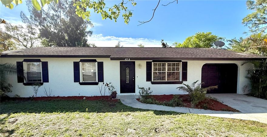 Welcome to this Beautiful Move-In Ready 3 bedroom, 2 bath home with a garage in Brentwood Estates! The Interior and exterior has been tastefully painted. Large living room and dining room space without giving up sqare footage in the bedrooms, which are all solid size.  Brand New garage door opener.  Tray ceiling in kitchen, all appliances including washer & dryer and sliding glass doors lead to lanai overlooking large fully fenced in backyard. Great curb appeal and excellent location close to popular schools, great shopping, superb dining and easy access to I75. This home is perfect for a family or an investor looking for solid rental income!  No deed restriction or HOA fees. Agent Related to Owner