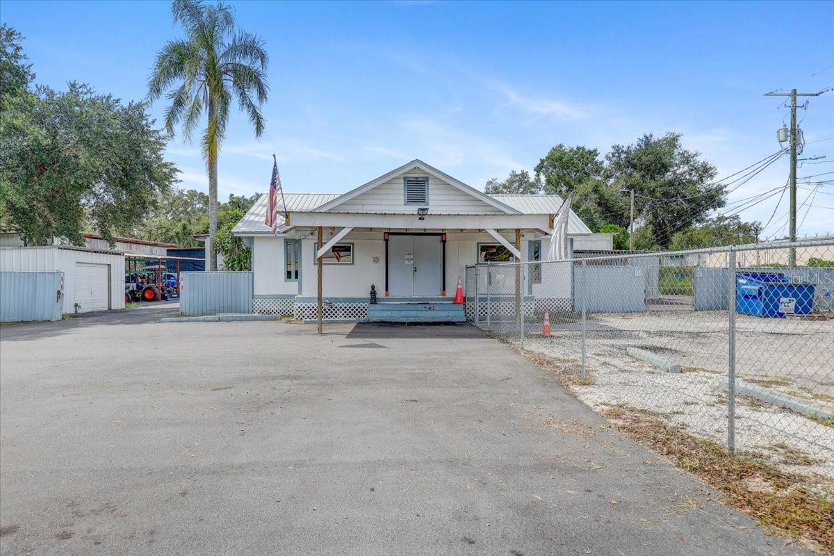 Prime Commercial Property – Consisting of 2 adjoined parcels totaling 3.3 Acres MOL with two office buildings on the High-Traffic Highway of U.S 92. The 2nd parcel is 11309 E. U.S. Highway 92. Unlock exceptional business potential with this rare opportunity to own over 3 acres of commercially zoned land located directly on a high-visibility, high-traffic highway with approximately 334' of road frontage on a very busy U.S. Highway 92. This strategic location offers outstanding exposure and accessibility being less than 1 mile from I-75 and having easy turn lane access. This property is ideal for a variety of commercial uses and currently operates as a repossession and towing company. The property features two newly renovated office buildings, with the main office featuring a reception area, lobby area, several offices, large storage areas, and kitchen area. The rear of the main office building has been renovated from previously open garages to now enclosed storage rooms with insulation and A/C. The additional office trailer is also renovated and has a main area and several additional office rooms. There are also several openworkshops on site with high ceilings some of which are currently used for a car wash. There are two additional steel storage buildings with garage doors. An RV parking pad with a 50 amp hookup and septic is on site, along with 2 wells, and 2 separate electric meters. The land has been completely cleared and asphalt/pavement has recently been poured for an abundance of parking available. The property is fully fenced with a new metal fence in the rear and back sides and a new chain link fence in the front and front sides. There are 3 security entry gates including an electric main entrance gate with remote opener. The land is high and dry in Flood zone X! A/C is less than 1 year old and the roof is approximately 4 years old. The zoning is General Commercial which provides flexibility and is suitable for professional offices, car lot, retail, distribution center, gas stations, manufacturing, mixed-use operations, and a whole lot more! Ample parking, established infrastructure, and multiple access points make this site move-in ready. With strong demographics and steady growth in the surrounding area, this property offers both immediate utility and long-term upside. Whether you're expanding your business, looking for a turnkey investment, or seeking a redevelopment opportunity, this location delivers. Don’t miss your chance to own a premium commercial asset in a proven corridor!