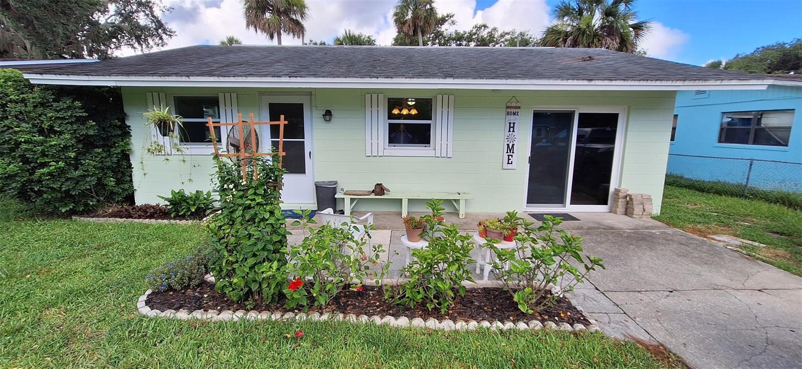 I am completely remodeled, light bright and shinny. I am a 3/1 concrete block home located at the end of a dead end street. I have a small canal that runs behind an oversized back yard with enough room for a pool. I have been loving remodeled with new LPV flooring and new Hurricane rated Windows and Doors. My kitchen is new from top to bottom with stainless appliances a breakfast bar and attached dining room. Many years ago, my porch was converted to the family room. Just before the door to the backyard is the utility room with washer and dryer hook-up and a tankless water heater. I am close to shopping and restaurants. There is always a festival or community activity near by. I am a short drive to New Smyrna’s driveable beach that you can park your car or ride your bike on to enjoy the rippling waves of the ocean and watch the dolphin frolic and play with the seagulls. Daytona Beach and its racing and bike-weeks are only 1/2 an hour drive and St Augustine about an hour drive to the north. An hour drive to the south is Merrit Island Wildlife preserve and Cape Canaveral/Kennedy Space Center where you can catch rocket launches. You can also see the launches from your yard. My owners have lived here for over 43 years and are ready to enjoy new adventures . I am in a flood zone. I have never had a flooding problem until the past few years with major storms and I have flooded several time, so Flood Insurance is required for financing. My remodeling and repairs have been tastefully done by a licensed contractor and remediator. Why not make an appointment to see me today? I know you are going to love to make me your forever home. I am waiting to meet you!
