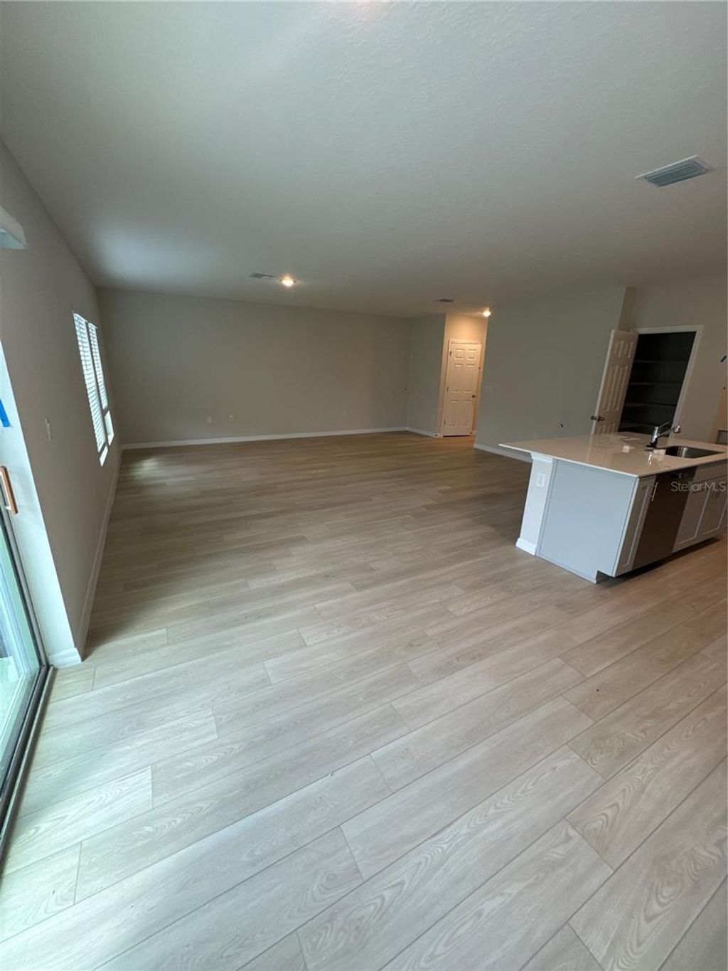 Photo of 7629 Hydrangea Lane, Wesley Chapel, FL 33545 (MLS # O6349074)