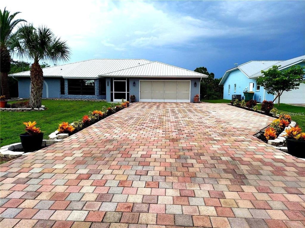 Photo of 17026 Edgewater Drive, Port Charlotte, FL 33948 (MLS # C7512354)