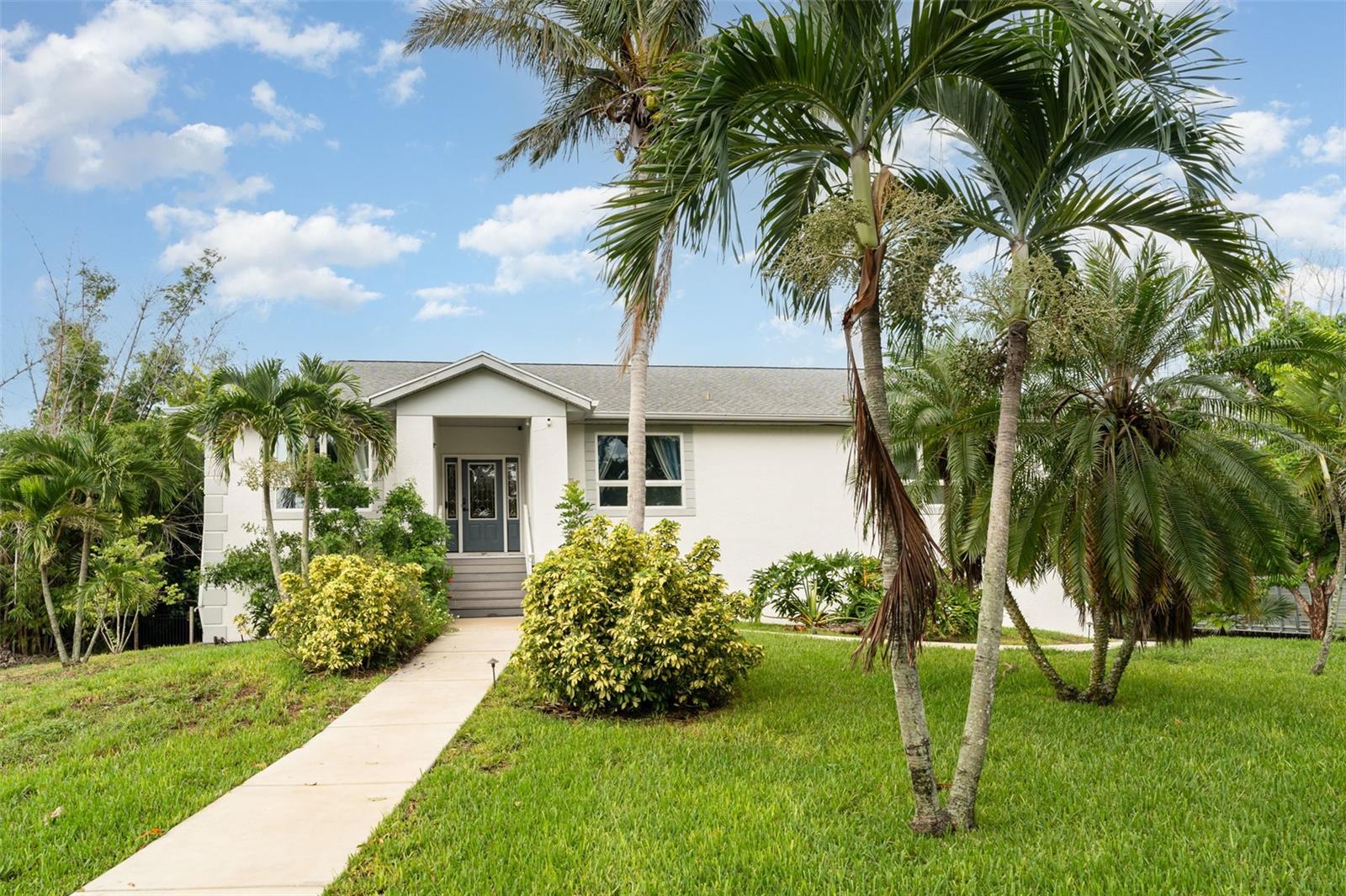 Discover this Rare Coastal gem on a private one-acre lot. Close to Geraldson’s Farm, minutes to Robinson’s Preserve, Palma Sola Botanical Gardens, and De Soto National Park. This property is all about the Location. This retreat offers both exceptional lifestyle and investment potential. Currently being used as a 5-bedroom Airbnb with 4.5 baths. Inside, balances elegance and comfort with a smart split layout. Three of the bedrooms have private bathrooms, providing luxury and privacy for family or guests. Vaulted ceilings and with lots of natural light throughout, the large kitchen is chef’s delight—with custom cabinetry and an open breakfast nook that anchors the home’s gathering space. Whether you’re enjoying your morning coffee in the sunroom or stepping outside into your own Florida sanctuary: where you will find the enclosed heated pool (resurfaced in 2019), partially fenced yard with lush grounds that have been refreshed with new sod. Whether entertaining or relaxing, the outdoor space is designed to impress. Car collectors and hobbyists will fall in love with the expansive Garage with humidifier —large enough to fit up to six vehicles plus workshop space. Premium updates add peace of mind: Newer interior paint (2024) Newer HVAC with nest thermostat (2024), Anderson impact windows and sliders, newer roof (2017), dual hot water heaters, and smart-controlled security and irrigation systems. Less than 10 minutes from the beaches of Anna Maria Island, this location delivers the best of Florida’s Gulf Coast. And with Geraldson’s Farm as your neighbor, fresh local produce is just steps away. With no HOA restrictions, the property can continue as a profitable short-term rental or become a spacious forever home. Come live and enjoy this Florida Coastal Dream today!!