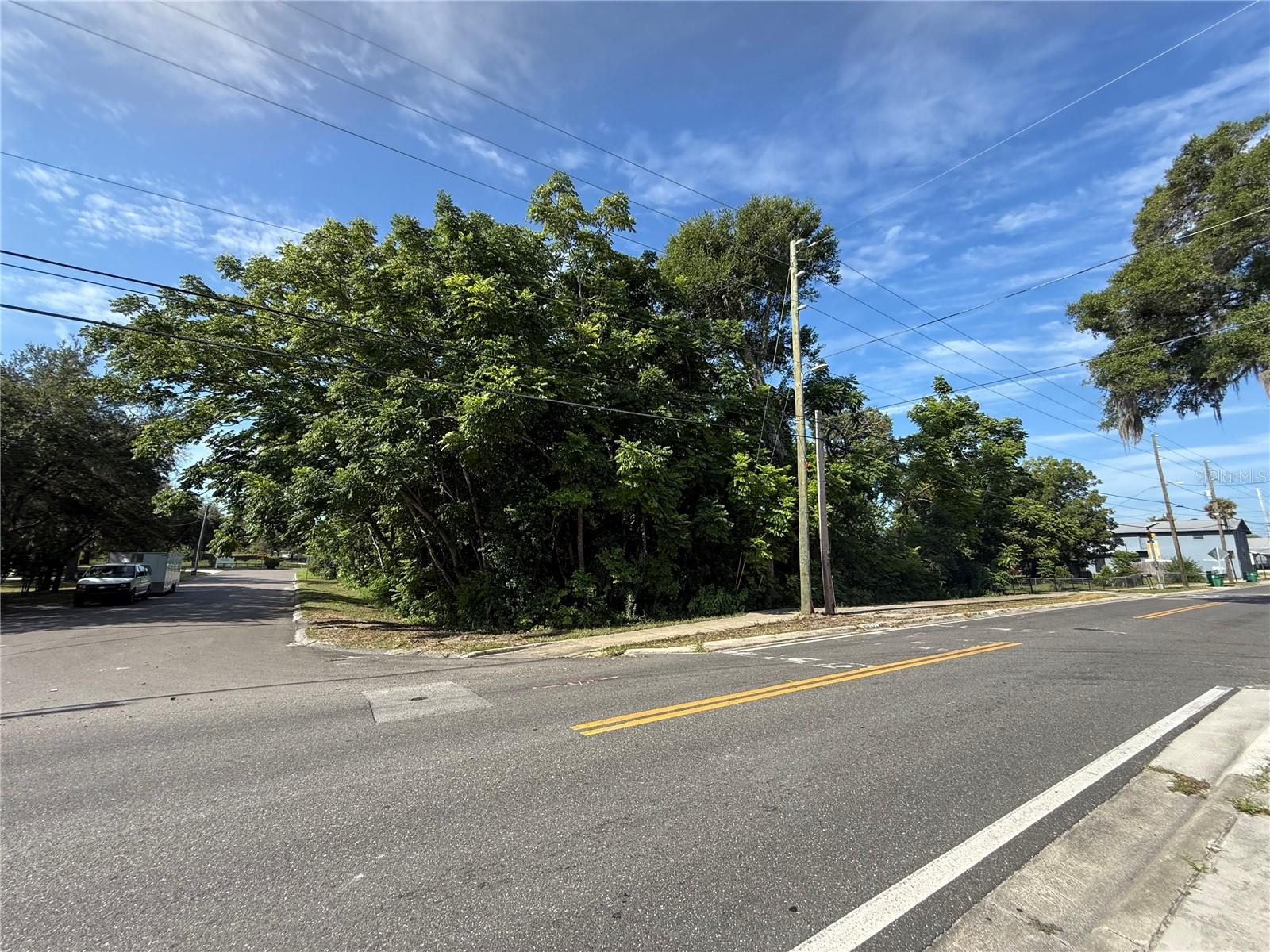Beautiful treed double lot (100' x 144' total) in DeLand. This corner lot is waiting for you to build your dream home on it! One block from Spring Hill Park and close to downtown DeLand. ***This is a court ordered Bankruptcy sale, so Seller and REALTOR have no knowledge about the property. Offers must be presented on a specific contract, including disclosures, and the closing date will take place within 10 days of court approval of the sale. Ask your agent to download the contract documents or contact the listing agent to obtain them.***