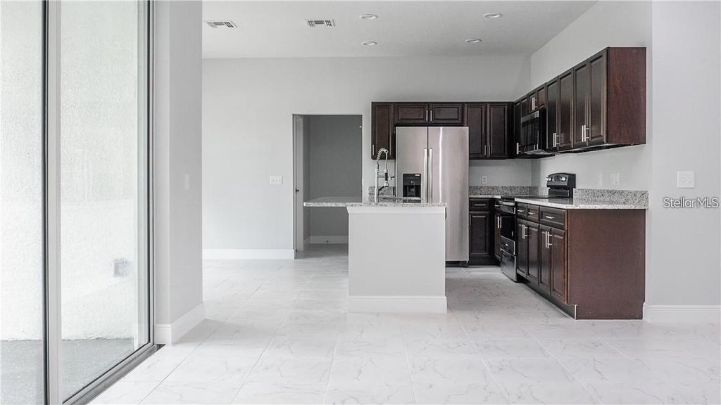 Photo of 1 Flatfish Drive, Kissimmee, FL 34759 (MLS # S5145463)