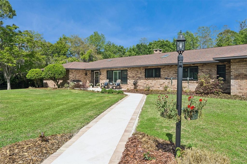 Photo of 1908 Poppy Lane, Port Orange, FL 32128 (MLS # O6395149)