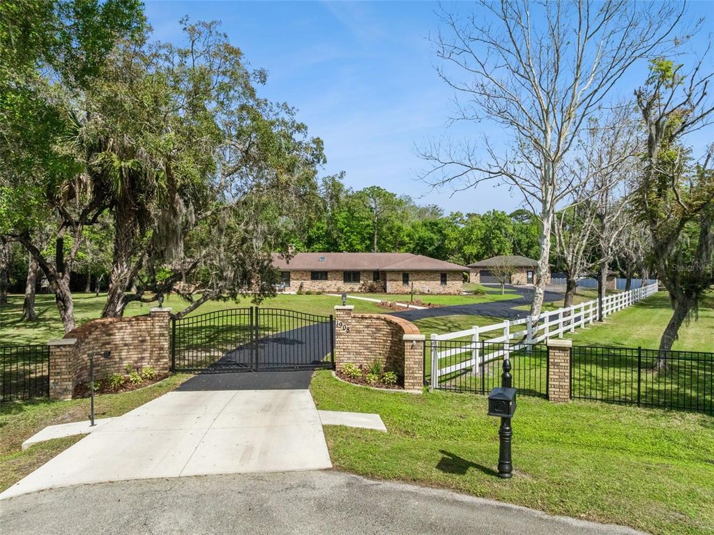 Photo of 1908 Poppy Lane, Port Orange, FL 32128 (MLS # O6395149)