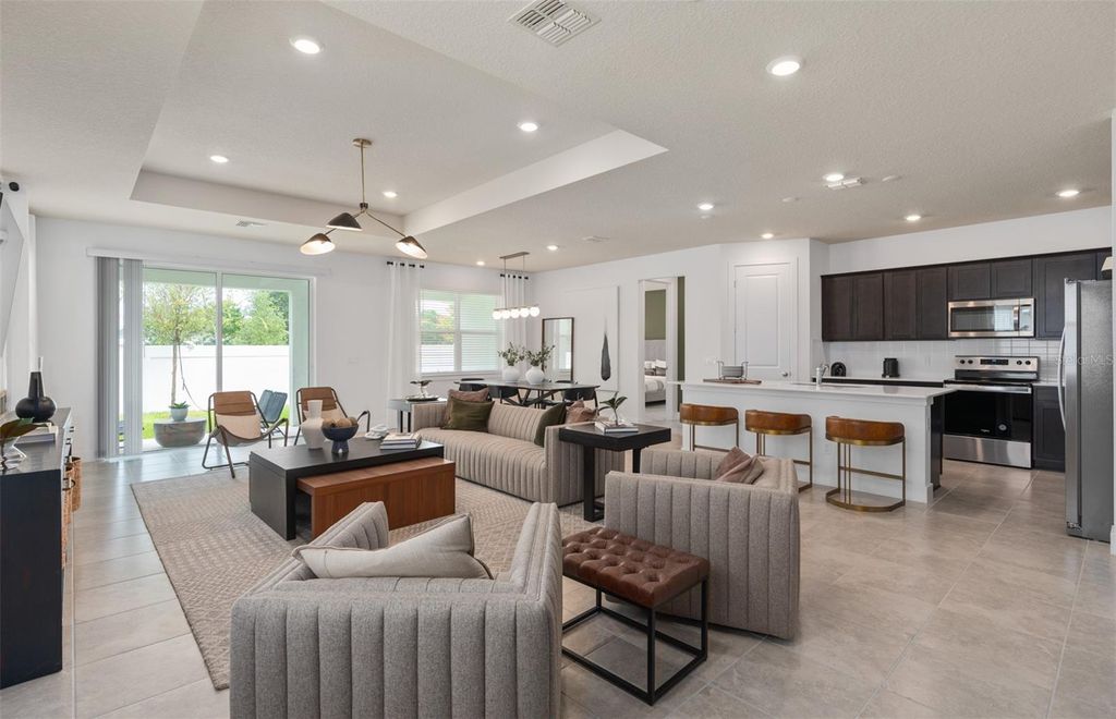 Photo of 3290 Ellsworth Avenue, Davenport, FL 33837 (MLS # O6411002)