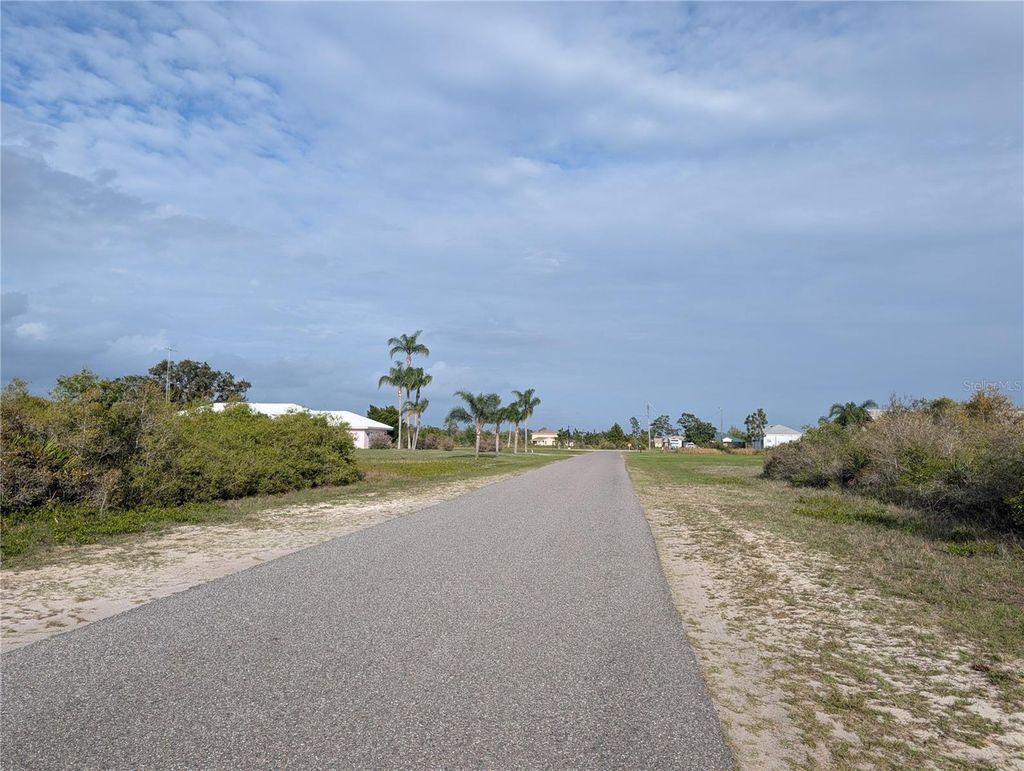 Photo of 12 Poinciana Drive, Indian Lake Estates, FL 33855 (MLS # P4938273)