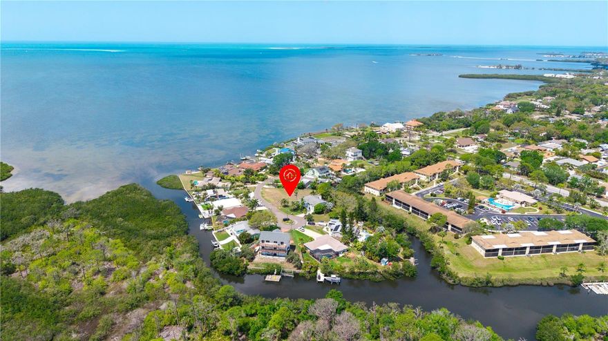 Rare opportunity to own an OVERSIZED .33-acre lot with direct Gulf access, offering the perfect setting to build your dream WATERFRONT home. This spacious property provides plenty of room for a custom residence, pool, and outdoor entertaining area—all designed to take full advantage of breathtaking sunset views.

Enjoy boating, fishing, and waterfront living right from your backyard, with easy access to open waters. Whether you're planning a full-time residence, vacation getaway, or investment property, this lot offers exceptional potential.

Ideally located in a GOLF CART friendly community just minutes from beautiful local beaches, as well as a variety of popular restaurants, shopping, and everyday conveniences. Experience the perfect balance of coastal lifestyle and accessibility with the privacy of being on a culdesac. A soil Percolation Test and Architect drawings for a 2900 sq. ft. raised home was performed & completed. 

Don’t miss your chance to secure a prime piece of Gulf-access land in a highly desirable area.