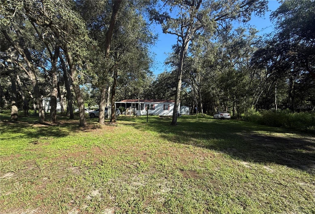 Photo of 34921 Punch Rd, Dade City, FL 33523 (MLS # TB8550231)