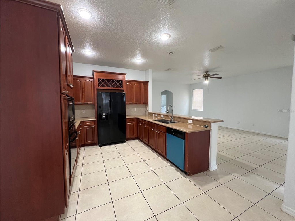 Photo of 1851 Sand Arbor Circle, Orlando, FL 32824 (MLS # O6447117)