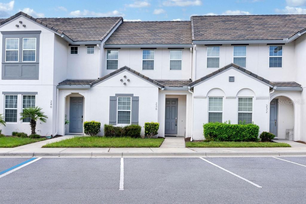 This beautifully furnished and stylish 3-bedroom, 2-bath townhome is back on the market for rent! Located in the desirable Enclaves at Festival Resort, this home offers a modern and contemporary design throughout.
The ground floor features an open-concept living and dining area, perfect for entertaining, along with a gourmet-style kitchen complete with a large granite island, breakfast bar, tile backsplash, pendant lighting, and stainless steel appliances. Abundant natural light flows in through the expansive sliding glass doors, which lead out to a covered paver patio and private heated swim pool with jacuzzi feature, plus a built-in grill and beautiful conservation view. Also on the main level is the master suite, featuring a king-sized bed and an en suite bath with a walk-in shower. A unique pocket door setup separates the bathroom space, allowing guests easy access to a half bath while preserving the privacy of the suite. Upstairs you’ll find two generously sized bedrooms and a full bathroom, along with a bonus flex space set up as a second living room or lounge area. Perfect for relaxing or working remotely.
Laundry area conveniently located near the kitchen
Privacy walls on both sides of the pool area
Access to the resort-style amenity center just around the corner, including a fitness center, poolside restaurant, splash pad, and more!
Located just a short drive from world-class shopping, dining, and all major Central Florida attractions!
Don’t miss out – A truly special property you need to see for yourself!