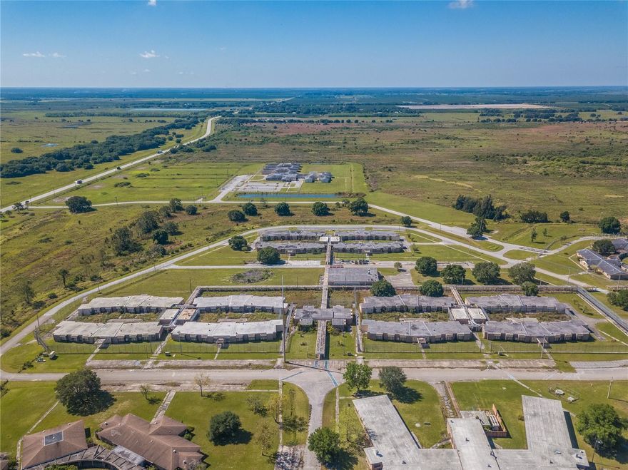 POTENTIAL INDUSTRIAL OR HOUSING OPPORTUNITY AWAITS!  Multiple buildings with dozens of individual rooms, bathrooms, office space, and cafeteria. Located in South DeSoto County directly off Hwy 31 on approximately 17 acres. Possible Seller Financing Available! This property was previously a part of the state owned juvenile justice center. ONLY 20 -30 minutes to Babcock Ranch, Ft Myers, Punta Gorda and Interstate 75.