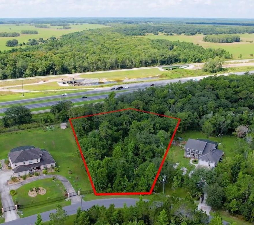 Discover the perfect opportunity to build your dream home in this highly sought after golf and equestrian community. 1.39 acres with ample dry land in the back, providing an ideal setting for your home while ensuring privacy.  Backing up to protected conservation land and the highway, you'll enjoy a serene and secluded atmosphere with no rear neighbors. Nestled in a peaceful, well-maintained neighborhood with easy access to major roadways, this lot offers a perfect blend of convenience and tranquility.  Whether you're envisioning a custom estate or an investment opportunity, this property provides the space and setting you need.  Don't miss out on owning a piece of Wedgefield's sought-after landscape!  Buyers responsible for due diligence.