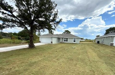 Photo of 14882 SW 31st Place, Ocala, FL 34481 (MLS # OM710061)
