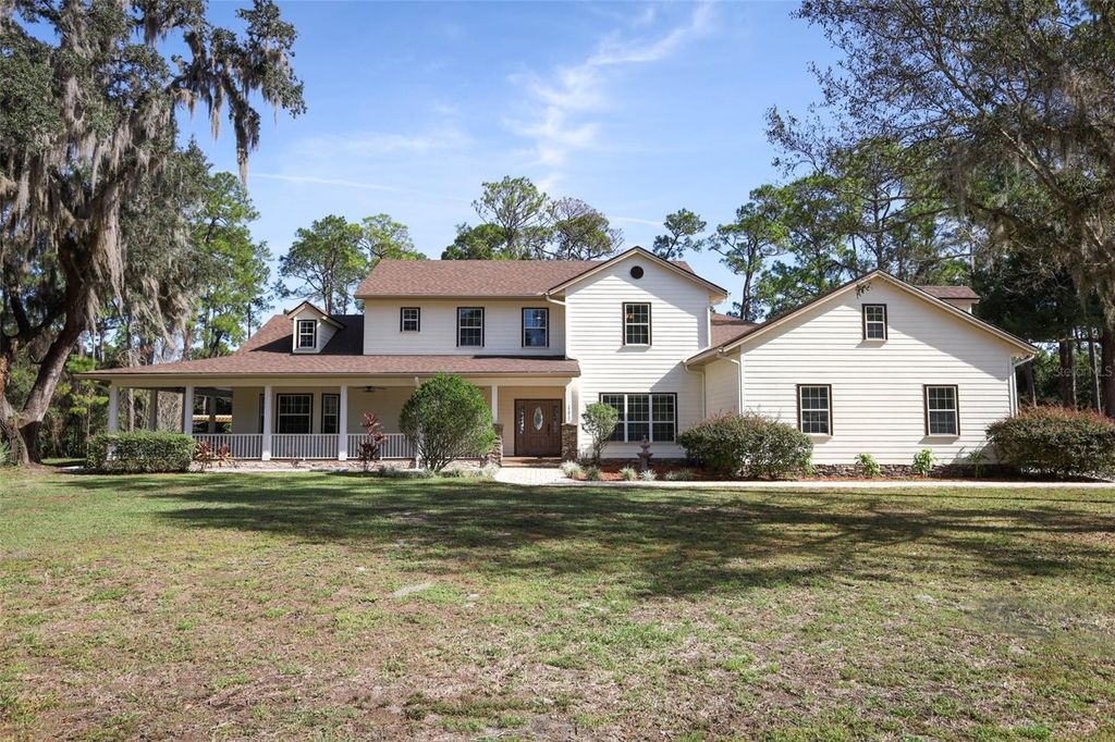 Photo of 27012 Grand Oak Lane, Tavares, FL 32778 (MLS # O6360186)