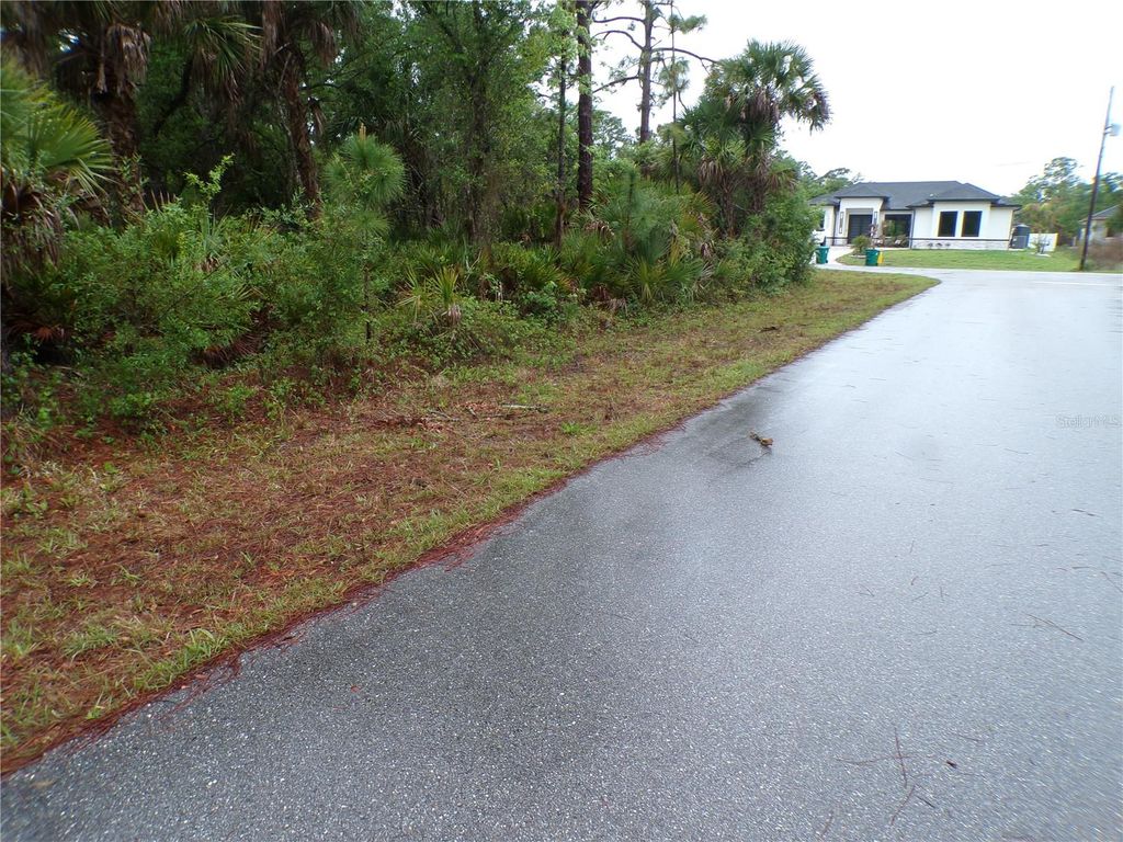 Photo of 14309 Harcourt Avenue, Port Charlotte, FL 33953 (MLS # C7524551)