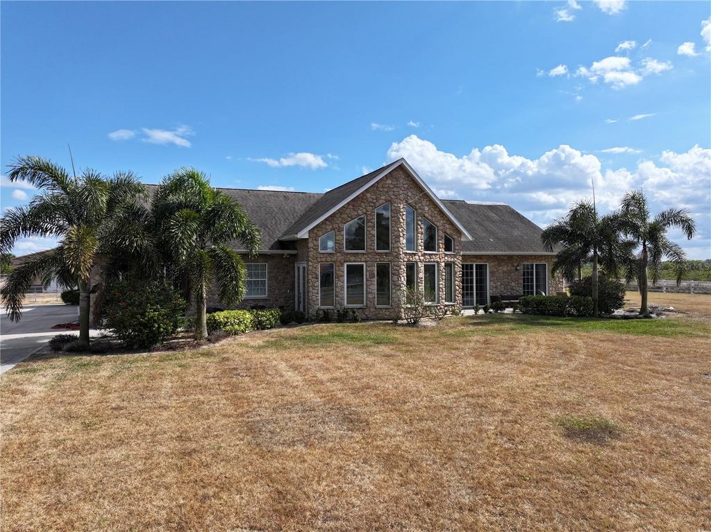 Photo of 186 S Bear Pointe Drive, Lake Placid, FL 33852 (MLS # O6383032)