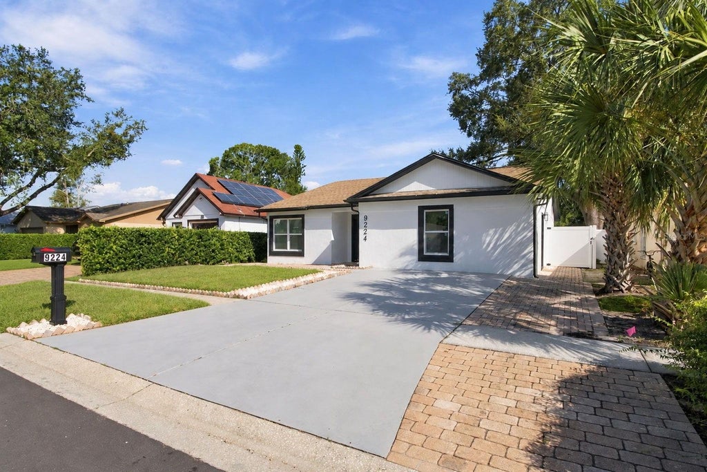 Photo of 9224 Camino Villa Boulevard, Tampa, FL 33635 (MLS # TB8539963)