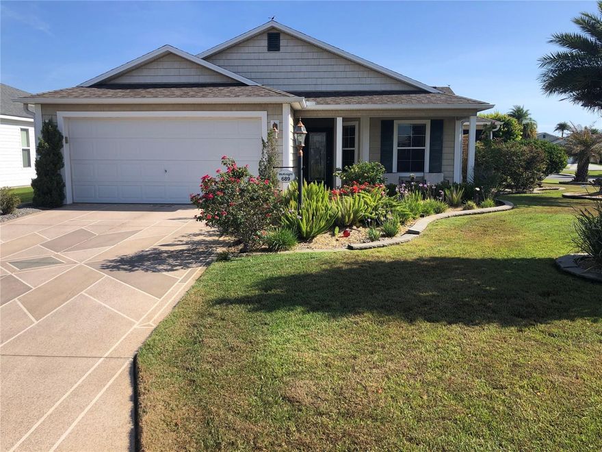 SHORT TERM RENTAL AVAILABLE Great location near Brownwood Square. Beautifully decorated 3 bedroom 2 bath AtEase Cottage home in The Village of Charlotte. Master bedroom has a king bed with a 32" wall mounted flat screen TV. Dual sinks and a walk in closet and shower. Second bedroom features a queen size bed and the third bedroom is set up as a sitting room for your reading enjoyment. Living room features a 42" flat screen TV and a nice seating area for viewing your favorite programs. Home also has an inside laundry and a 2 car garage. Golf cart for your pleasure. This home has a newly enclosed lanai! Located close to recreation center and Bonifay Country Club and both Pinellas and Colony Plazas are a short drive away, both featuring dining and shopping. Village ID's will cost you $50 for two. Non smoking an no pets